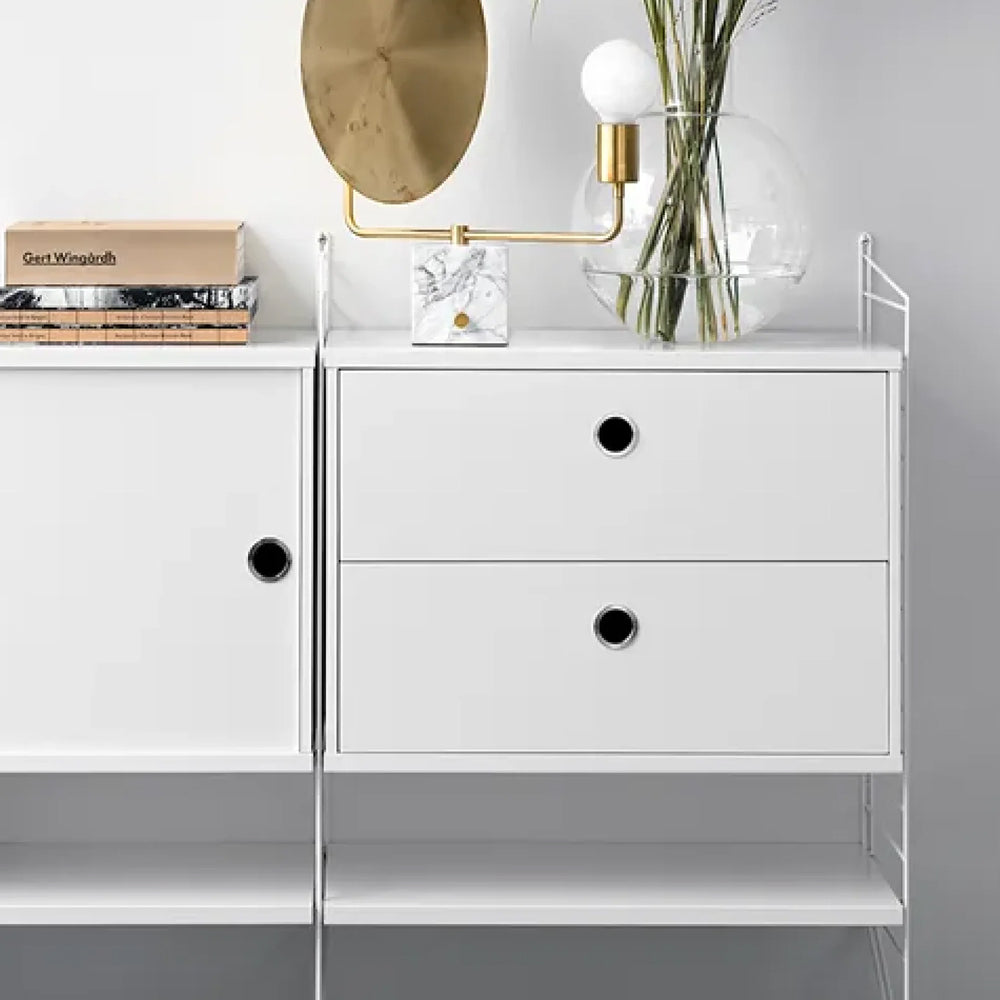 String Historien bak et ikonisk design