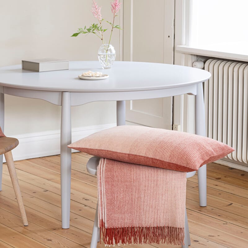 Putetrekk Horizon 40x60 Rusty Red på en krakk